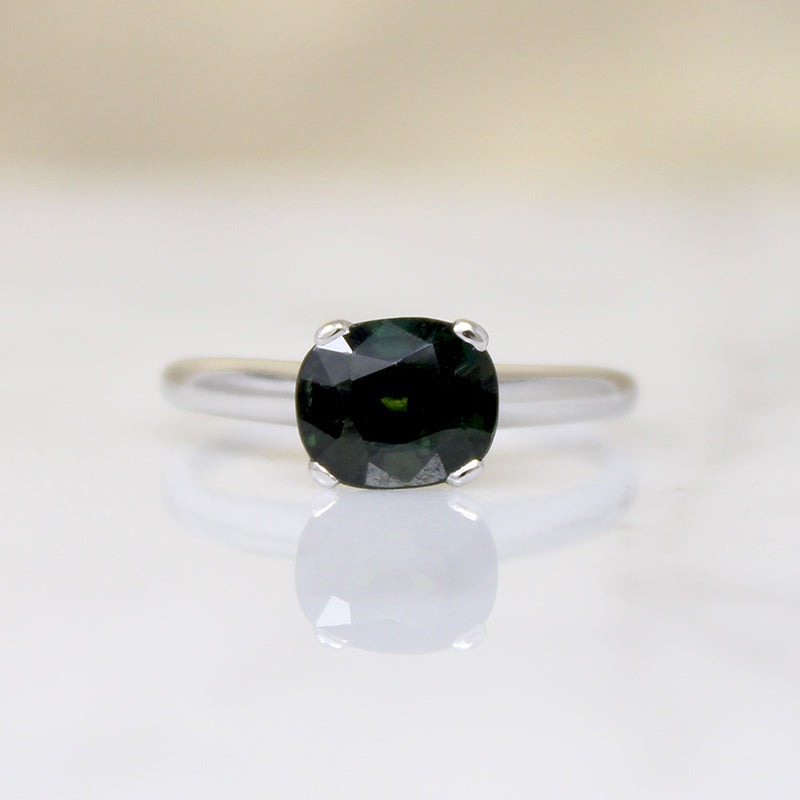 Deep Green Cushion Cut Sapphire in Platinum Solitaire