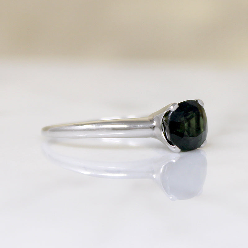 Deep Green Cushion Cut Sapphire in Platinum Solitaire