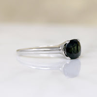 Deep Green Cushion Cut Sapphire in Platinum Solitaire