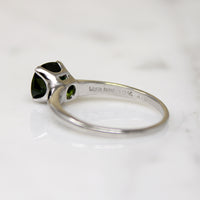 Deep Green Cushion Cut Sapphire in Platinum Solitaire