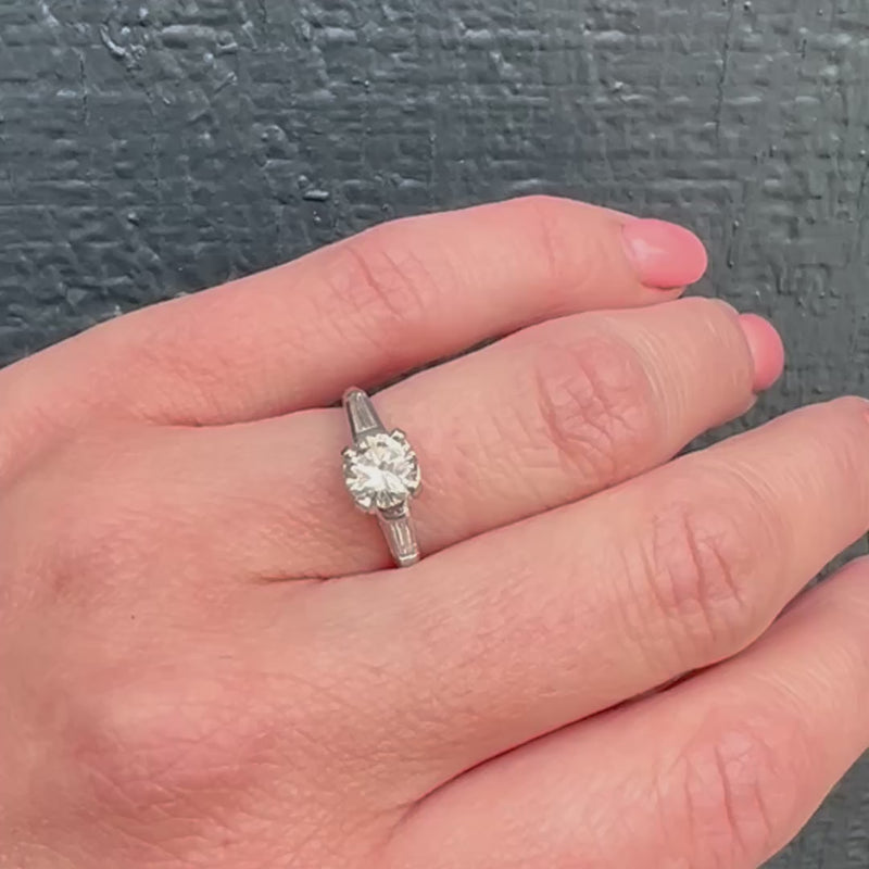 Elegant Platinum Engagement Ring with Baguette Accents