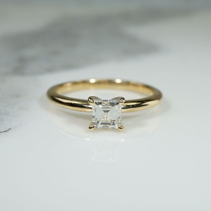 Exquisite Step-Cut Diamond in Gold Solitaire by 720