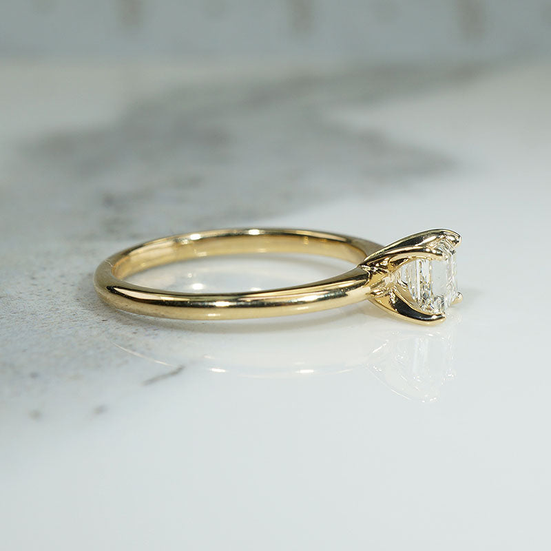 Exquisite Step-Cut Diamond in Gold Solitaire by 720