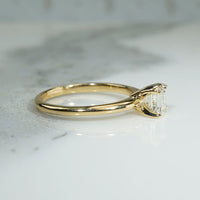 Exquisite Step-Cut Diamond in Gold Solitaire by 720
