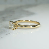 Exquisite Step-Cut Diamond in Gold Solitaire by 720