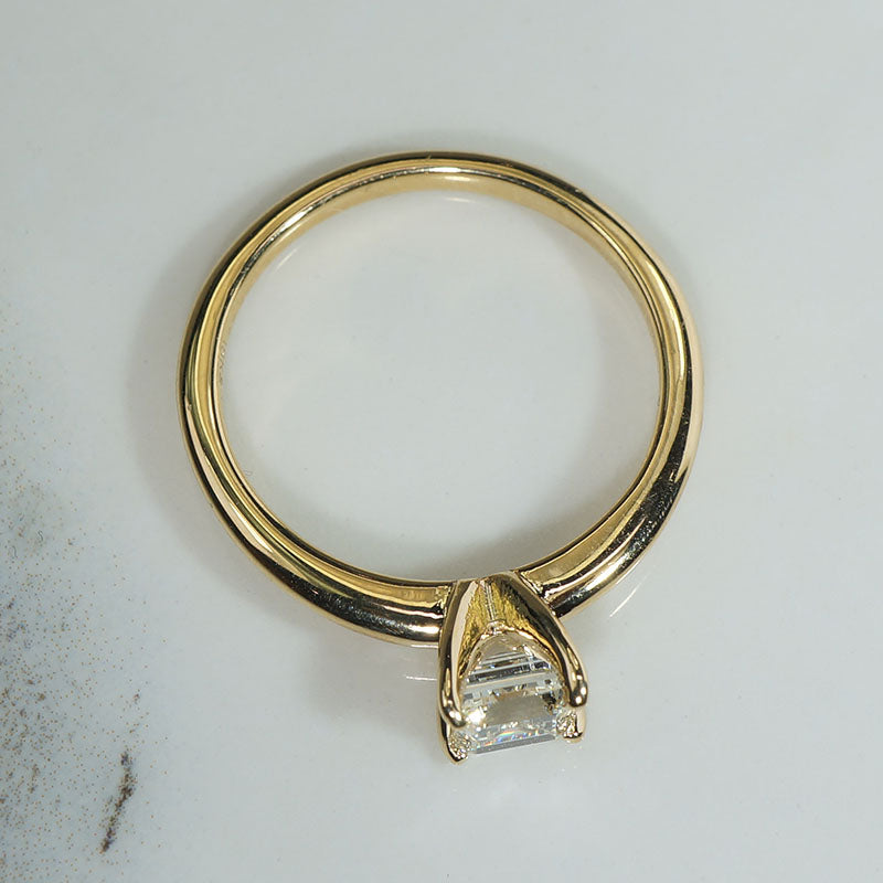 Exquisite Step-Cut Diamond in Gold Solitaire by 720