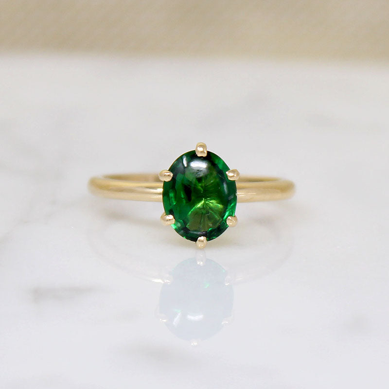 Magnificent Buff Top Tsavorite Garnet in 18k Solitaire Ring