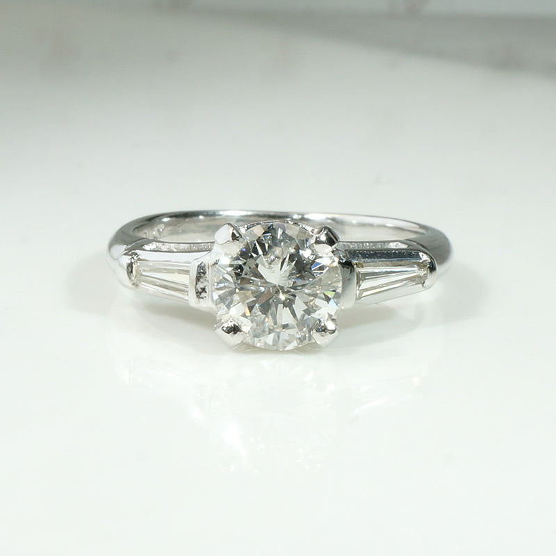 Elegant Platinum Engagement Ring with Baguette Accents