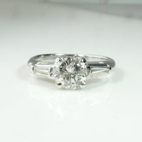 Elegant Platinum Engagement Ring with Baguette Accents