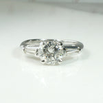 Elegant Platinum Engagement Ring with Baguette Accents