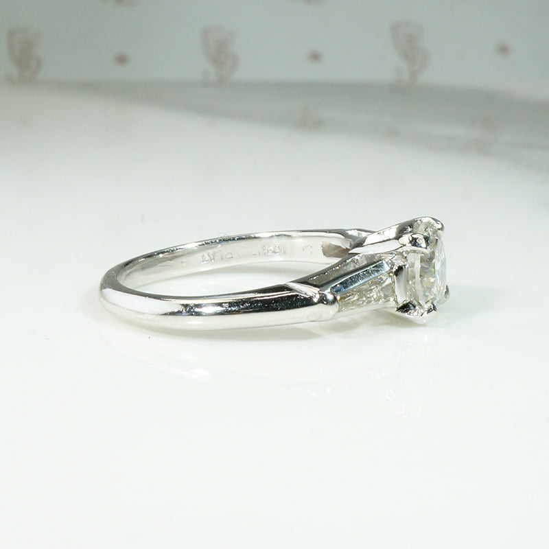Elegant Platinum Engagement Ring with Baguette Accents
