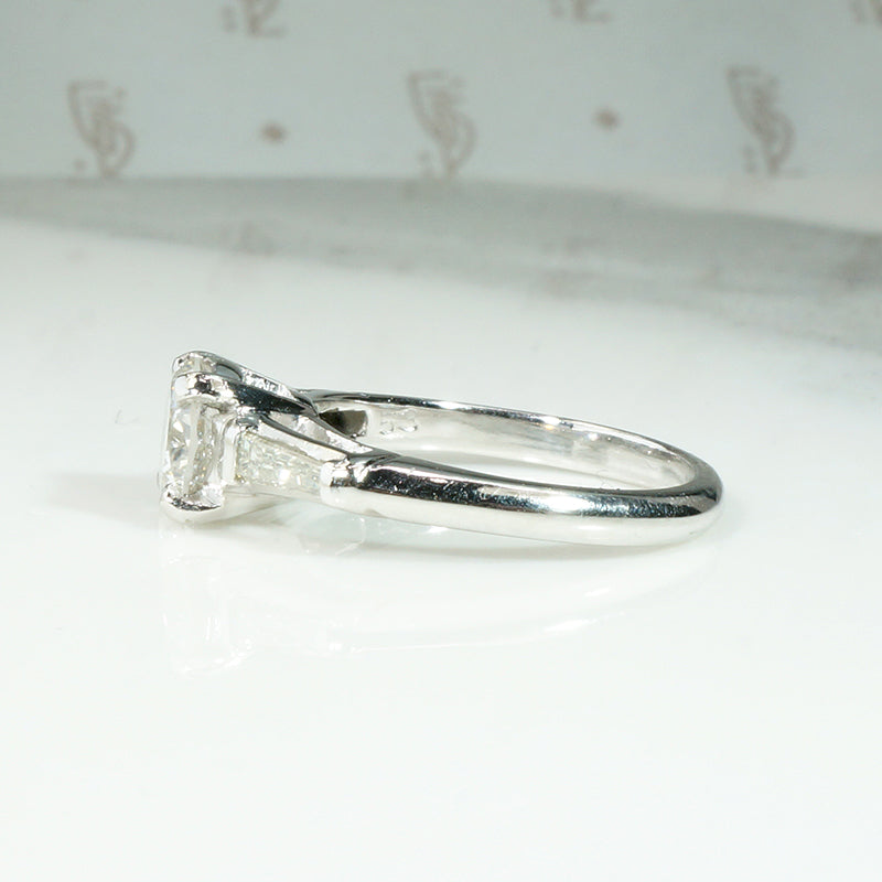 Elegant Platinum Engagement Ring with Baguette Accents