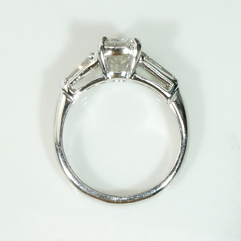 Elegant Platinum Engagement Ring with Baguette Accents