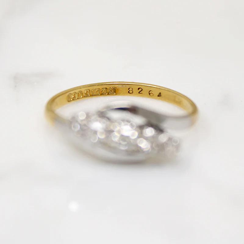 Five Diamonds in Platinum & 18ct Bypass Ring