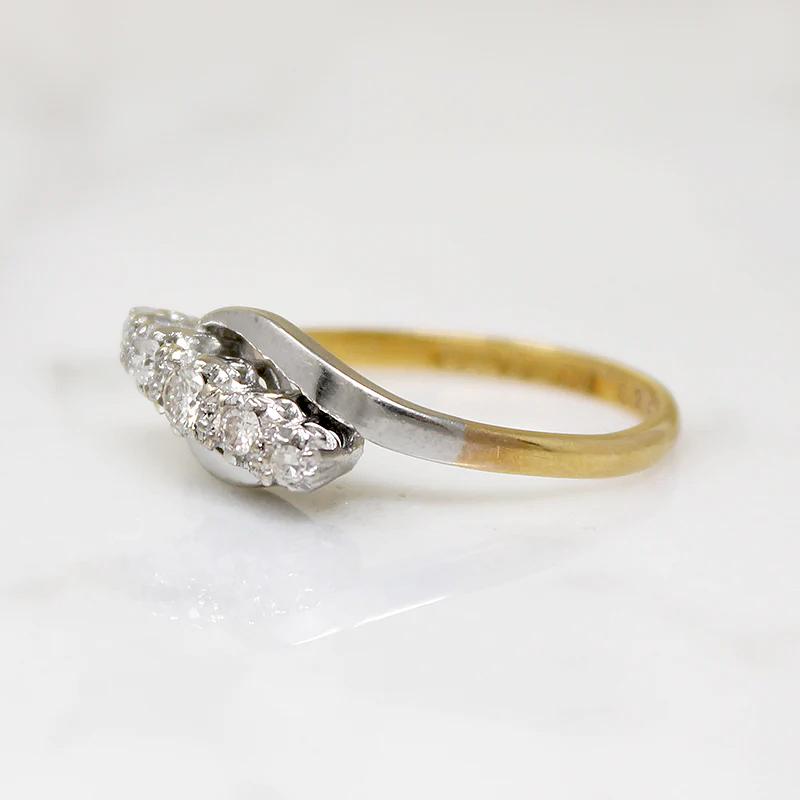 Five Diamonds in Platinum & 18ct Bypass Ring