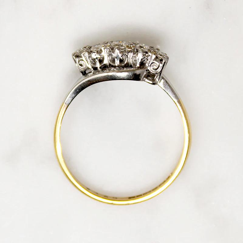 Five Diamonds in Platinum & 18ct Bypass Ring