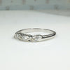 Three Diamond & White Gold Band with a Twist