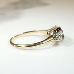 Incredible Ruby in Trilogy Ring with Dazzling Diamonds