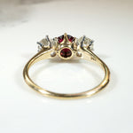 Incredible Ruby in Trilogy Ring with Dazzling Diamonds