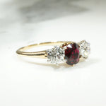 Incredible Ruby in Trilogy Ring with Dazzling Diamonds