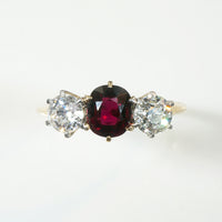 Incredible Ruby in Trilogy Ring with Dazzling Diamonds