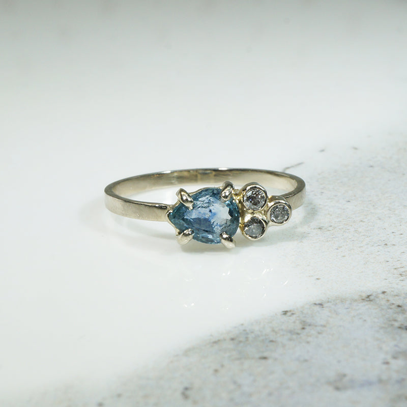 Jaunty Pear Cut Sapphire & Diamonds in White Gold Ring