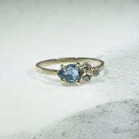 Jaunty Pear Cut Sapphire & Diamonds in White Gold Ring