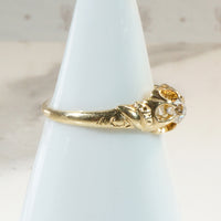 Belcher Diamond Solitaire with a Floral Twist 