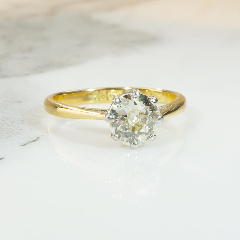 Dreamy Platinum and 18k Yellow Gold Solitaire