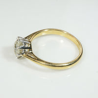 Dreamy Platinum and 18k Yellow Gold Solitaire