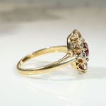 Smouldering Oval Ruby in Diamond Halo Ring