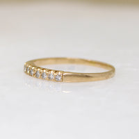 Slender Seven Diamond Band in Yellow Gold