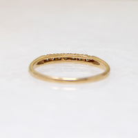 Slender Seven Diamond Band in Yellow Gold