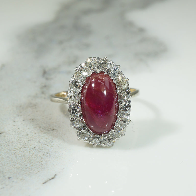 Magnificent Ruby Cabochon in Diamond Halo Ring