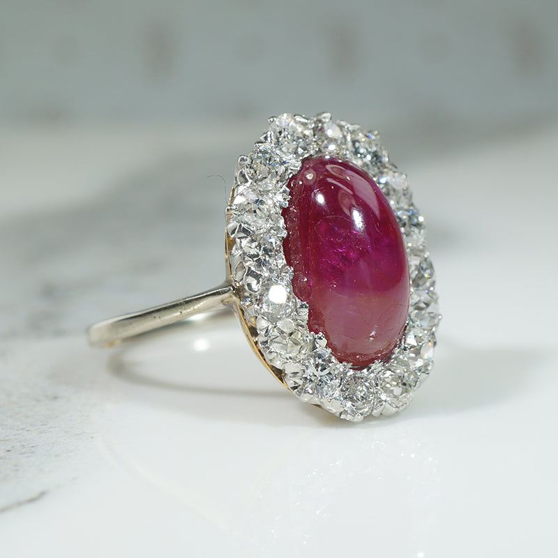 Magnificent Ruby Cabochon in Diamond Halo Ring