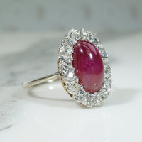 Magnificent Ruby Cabochon in Diamond Halo Ring