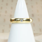 Buttery 18k Gold Band with Single Sparkling Diamond