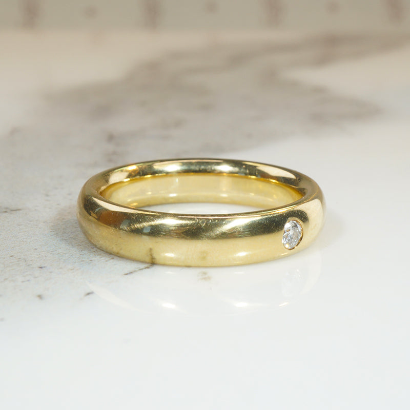 Buttery 18k Gold Band with Single Sparkling Diamond
