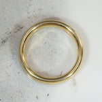 Buttery 18k Gold Band with Single Sparkling Diamond