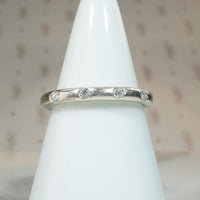 Curved White Gold and Diamond Band