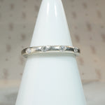 Curved White Gold and Diamond Band