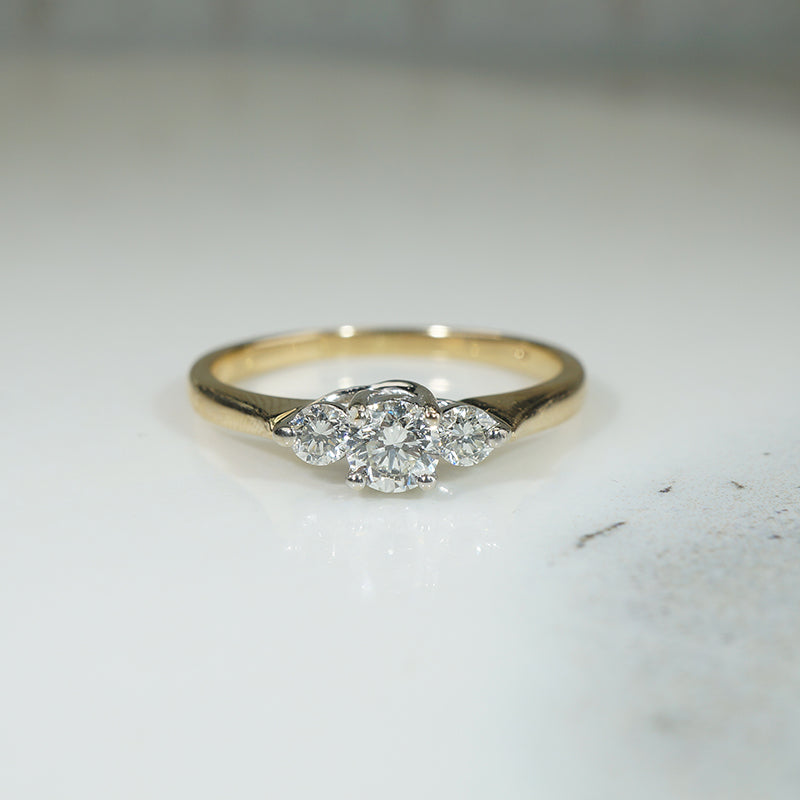 Graceful Two-Tone Diamond Trilogy Ring