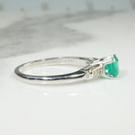 Fresh Green Emerald Engagement Ring with Baguette Accents