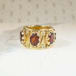 Ornate Garnet-Studded Wide Gold Band