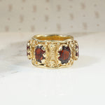 Ornate Garnet-Studded Wide Gold Band