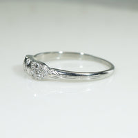 Buckle or Bow Diamonds & 18k White Gold Band