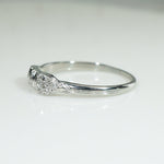 Buckle or Bow Diamonds & 18k White Gold Band