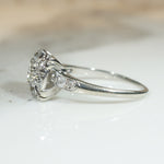 Antique Diamond Cluster in Platinum Engagement Ring