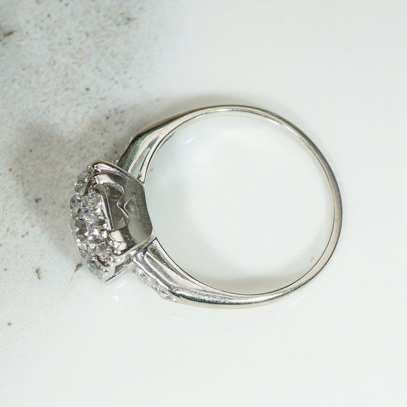 Antique Diamond Cluster in Platinum Engagement Ring