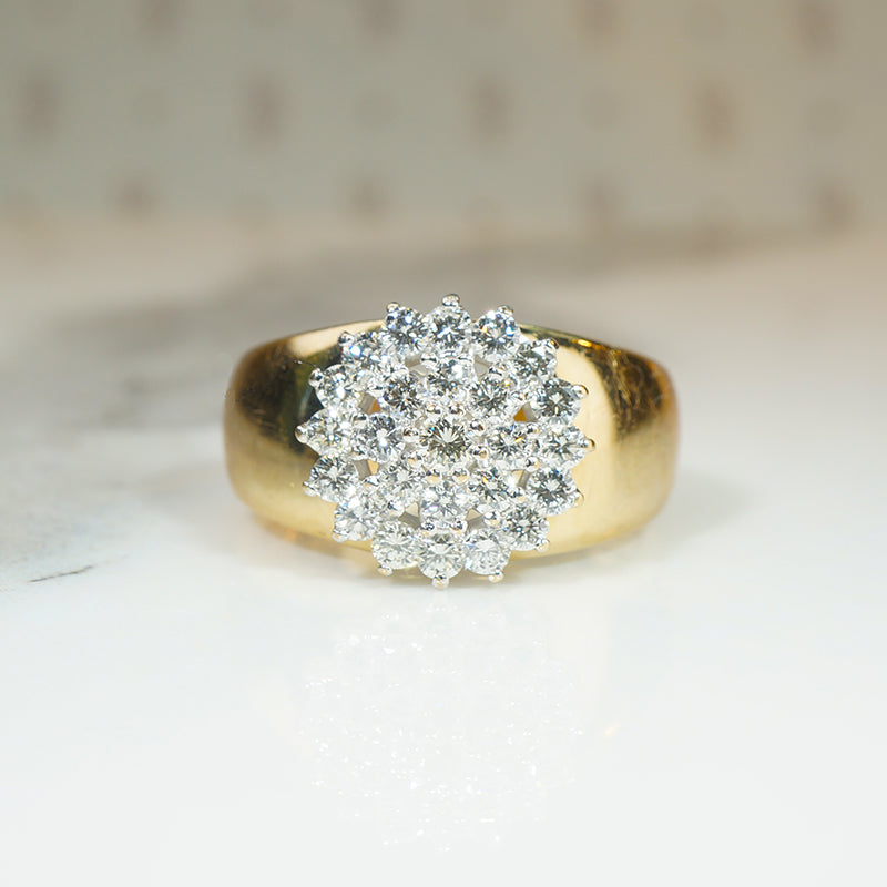 Dazzling Diamond Cluster on Curvaceous Gold Band